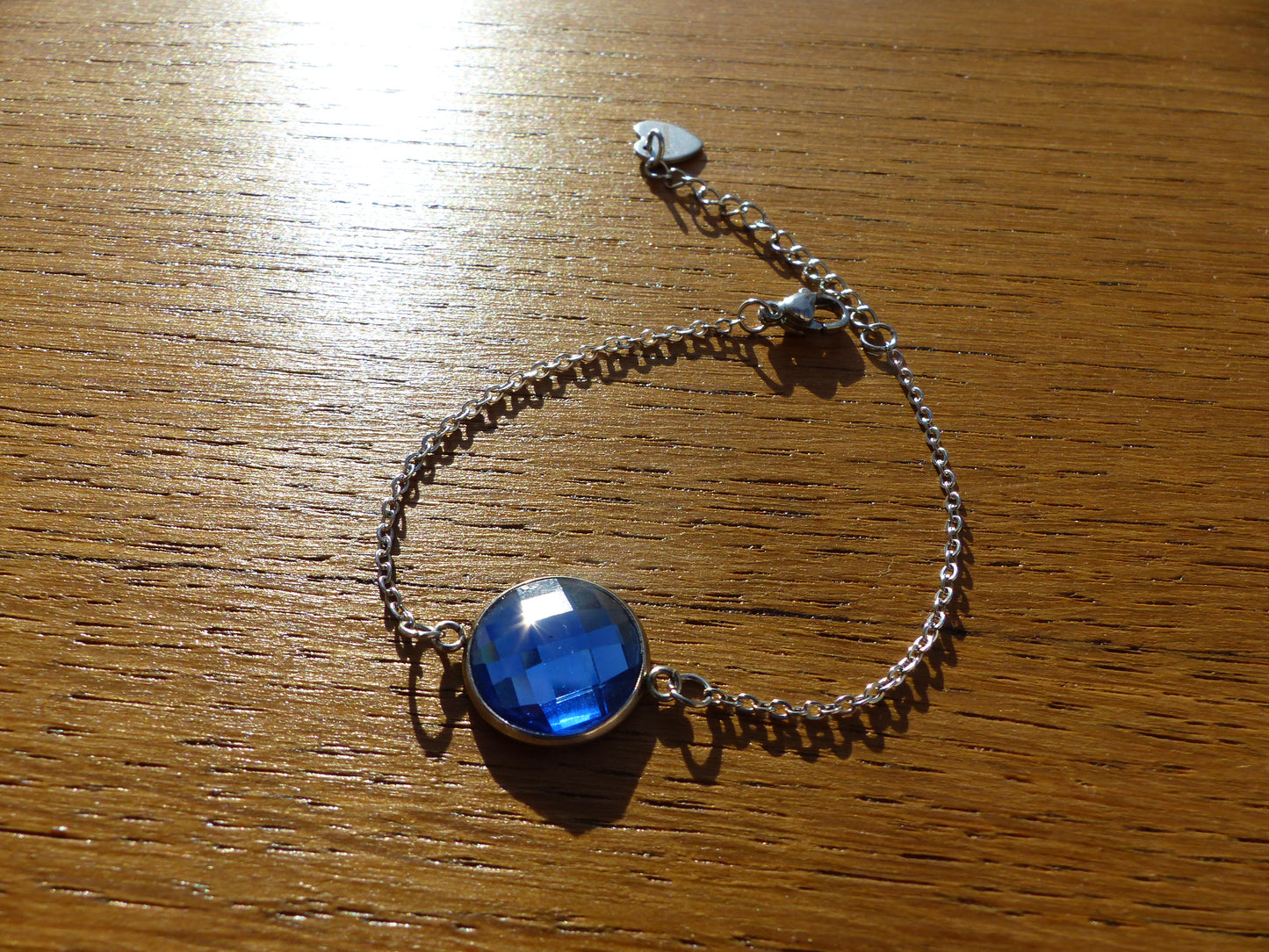 Bracelet en acier inoxydable argenté avec un cabochon de 14mm bleu