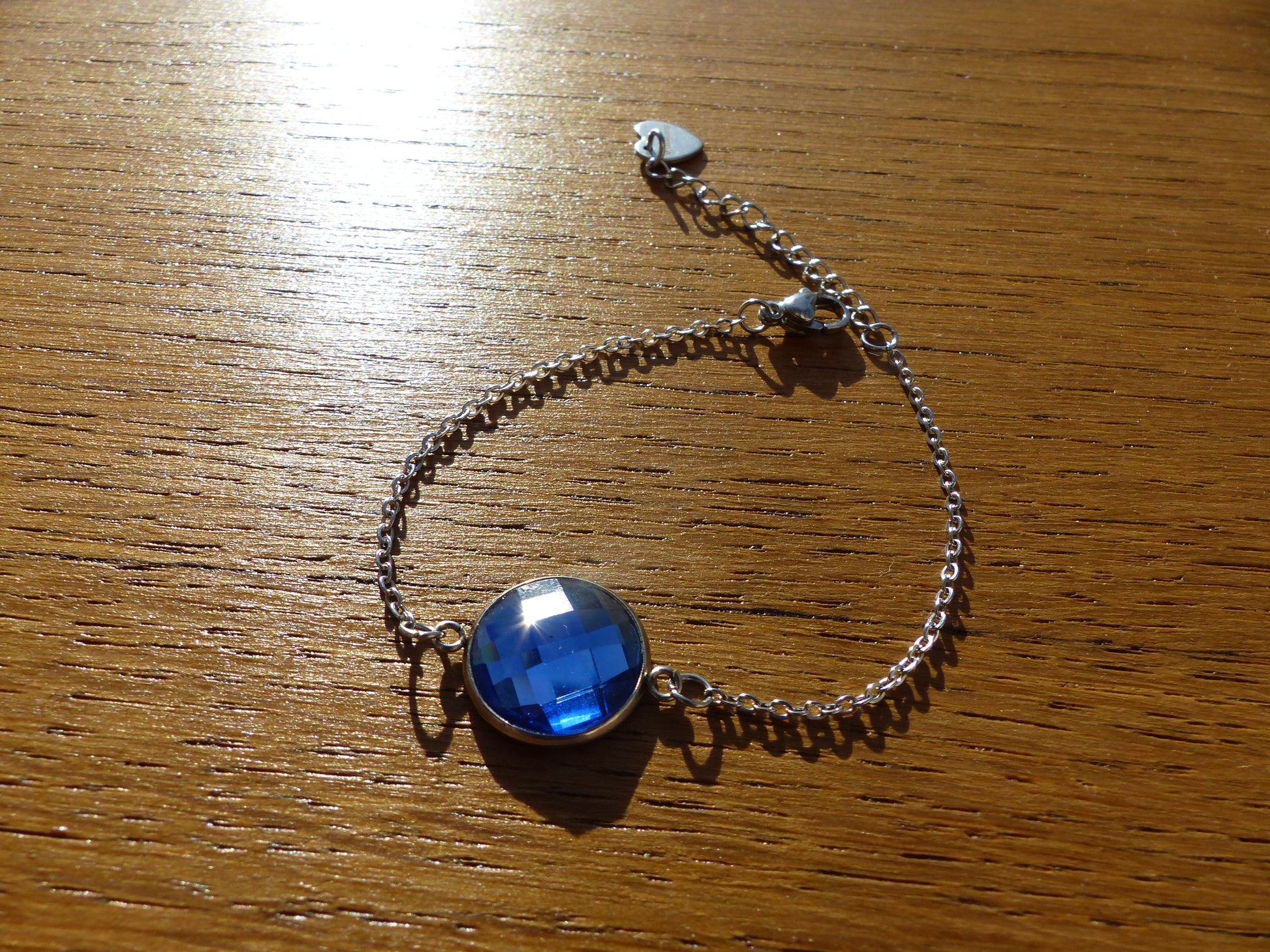 Bracelet en acier inoxydable argenté avec un cabochon de 14mm bleu