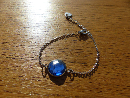 Bracelet en acier inoxydable argenté avec un cabochon de 14mm bleu