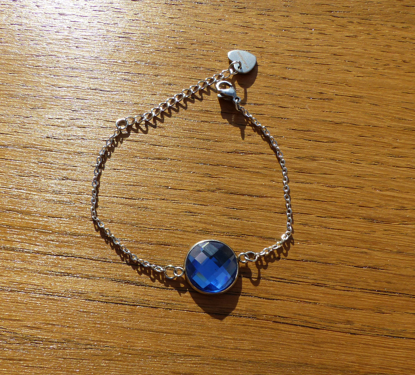Bracelet en acier inoxydable argenté avec un cabochon de 14mm bleu