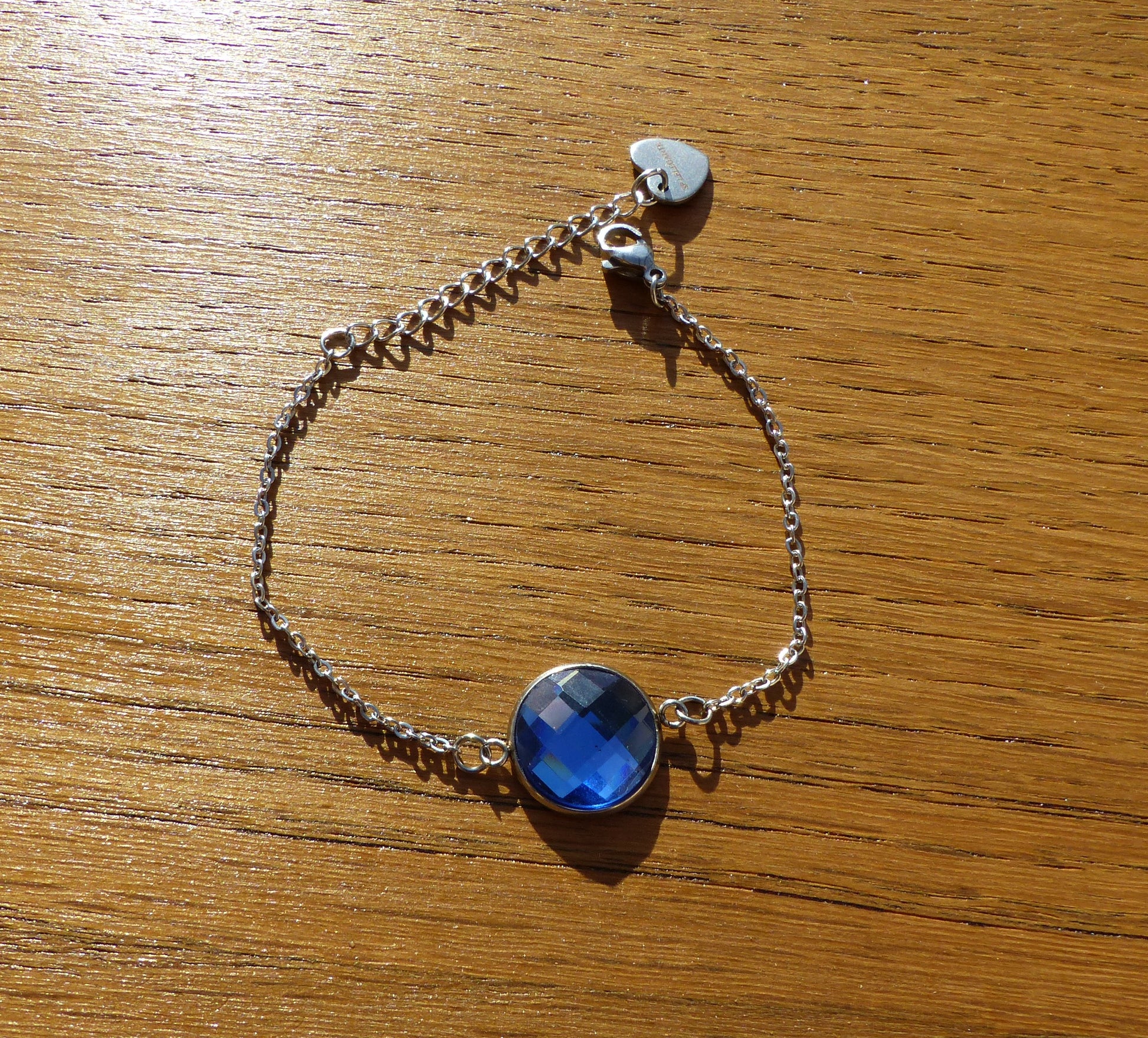 Bracelet en acier inoxydable argenté avec un cabochon de 14mm bleu
