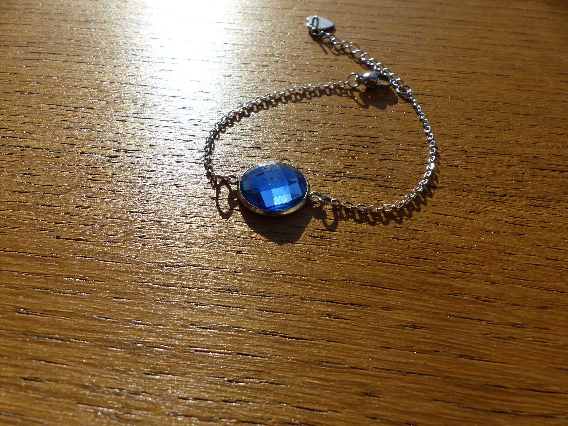 Bracelet en acier inoxydable argenté avec un cabochon de 14mm bleu