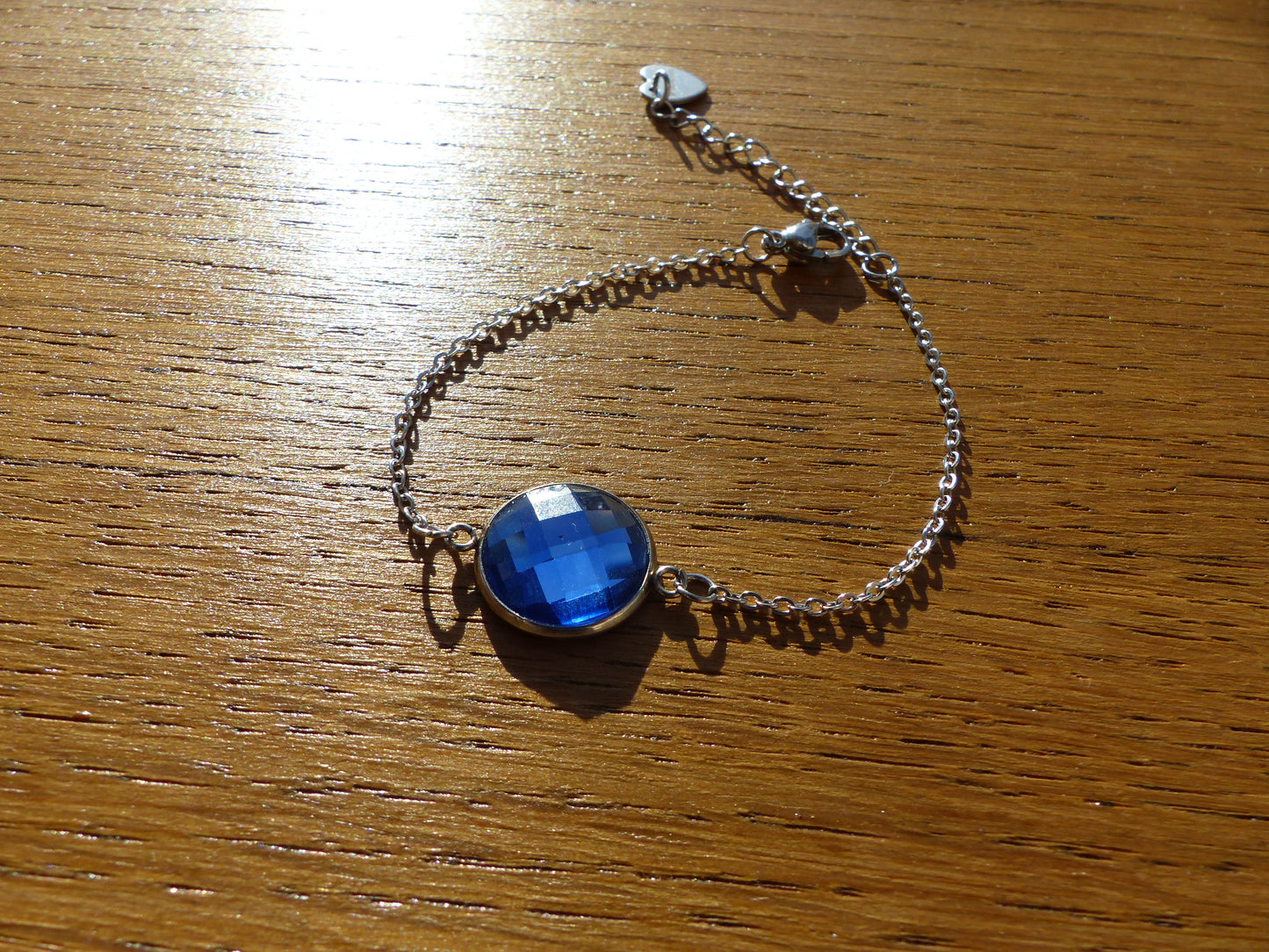 Bracelet en acier inoxydable argenté avec un cabochon de 14mm bleu