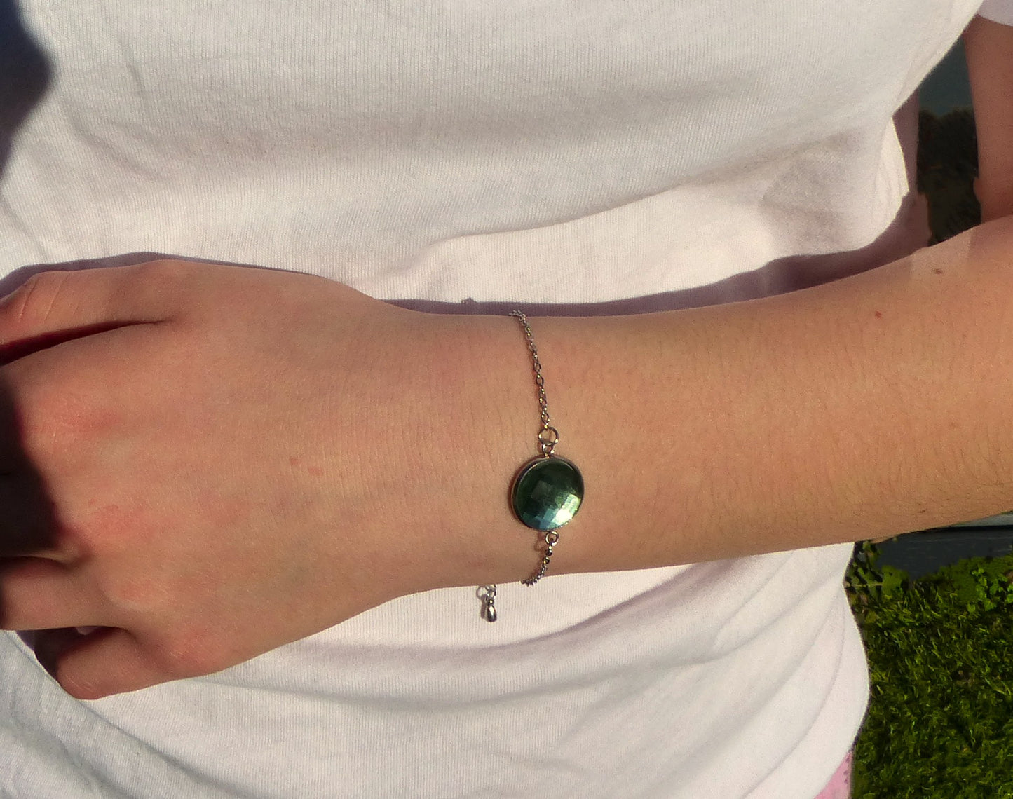 Bracelet en acier inoxydable argenté avec un cabochon de 14mm vert