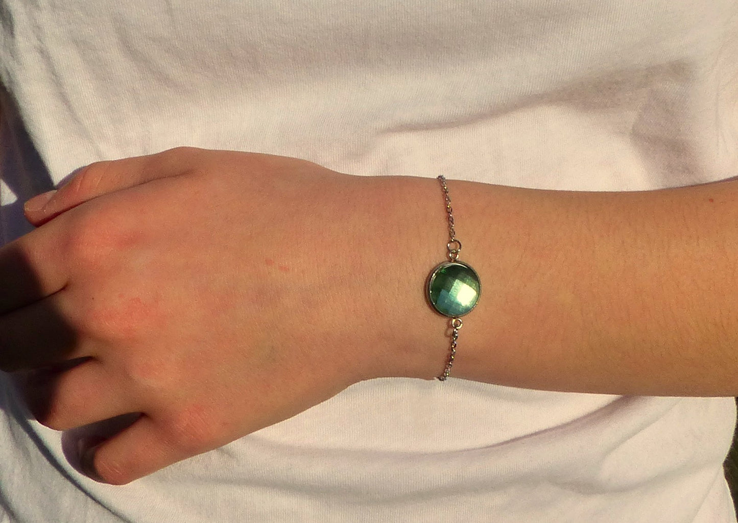 Bracelet en acier inoxydable argenté avec un cabochon de 14mm vert